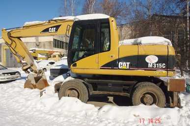 Foto: Verkauft Baustellenfahrzeug CATERPILLAR - M315C